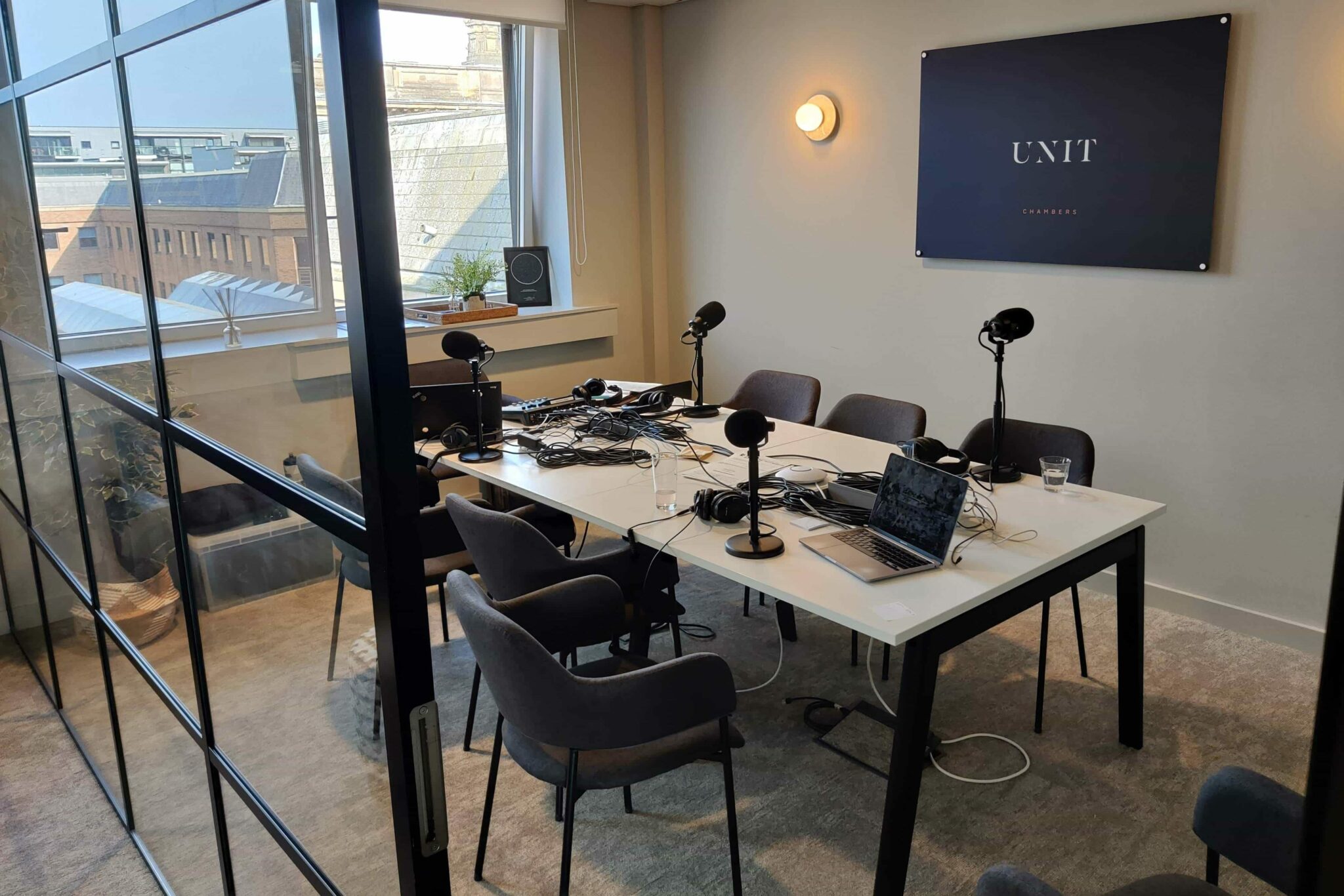 Innobella Media's pop-up podcast recording studio setup in the boardroom of Unit Chambers' city centre offices in Liverpool.